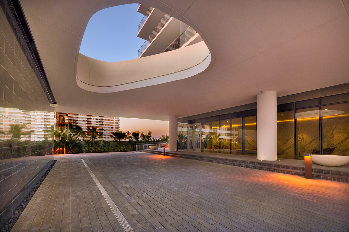 Architectural dusk entrance views at the 2000 Ocean condo in Hallandale Beach, FL.
