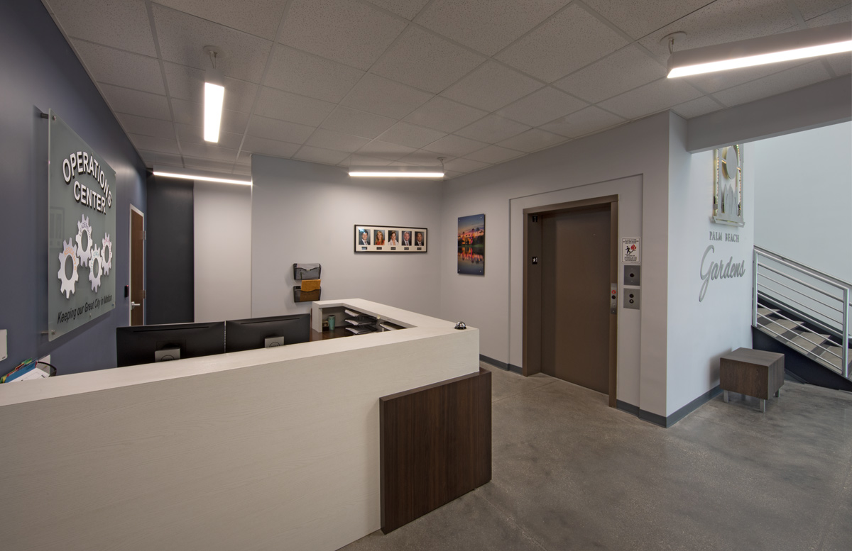 Interior design view of reception at the Palm Beach Gardens operations center.