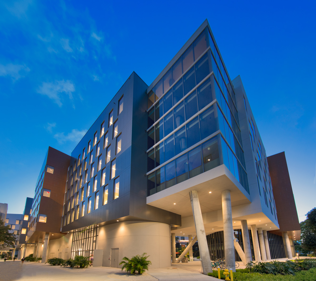 Architectural dusk view of UM Lakeside Village Student Housing in Miami, FL