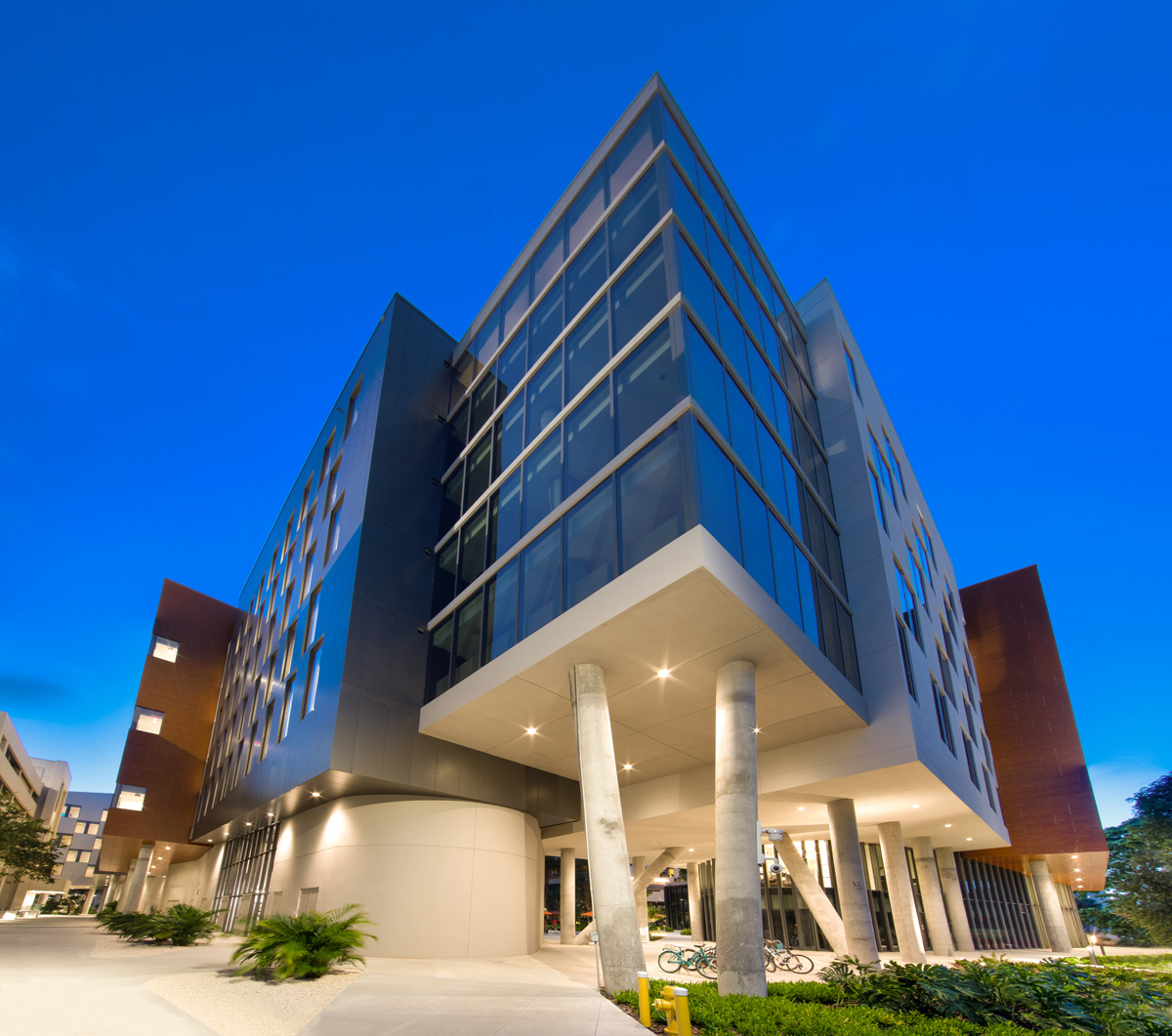 Architectural dusk view of UM Lakeside Village Student Housing in Miami, FL