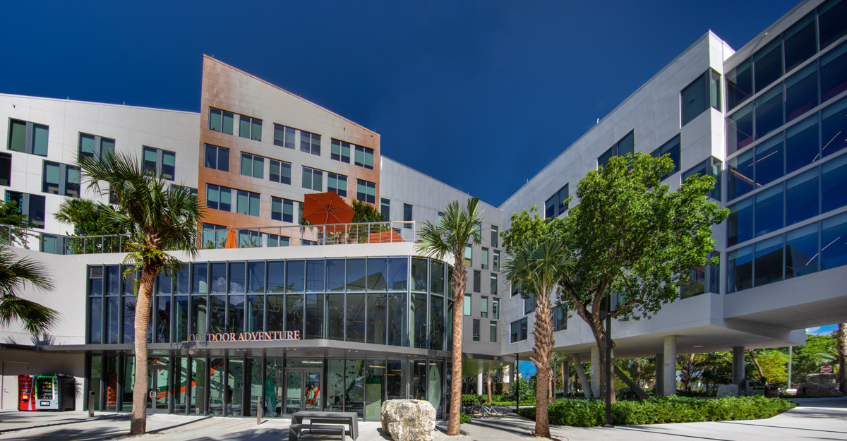 Architectural daytime view of UM Lakeside Village Student Housing in Miami, FL
