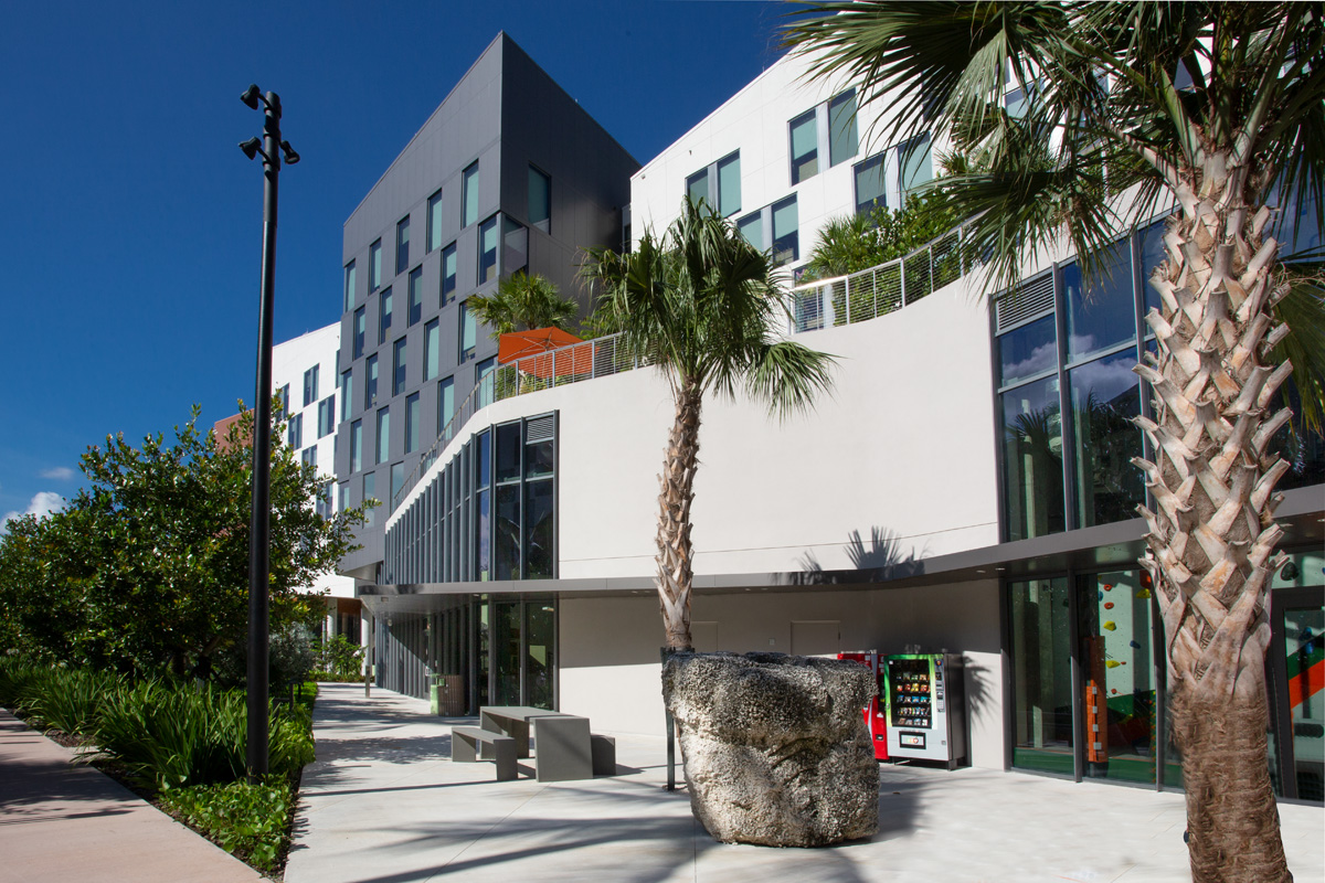 Architectural daytime view of UM Lakeside Village Student Housing in Miami, FL