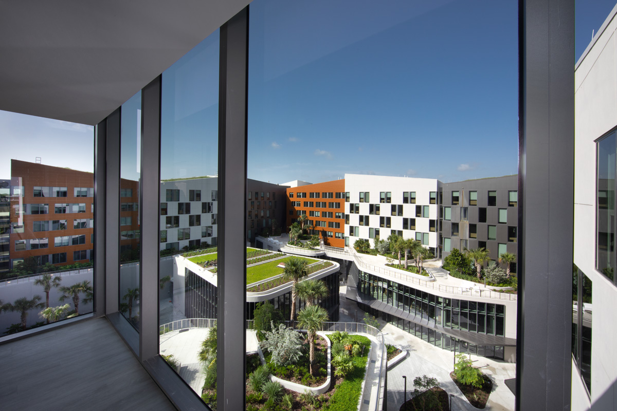 Architectural daytime view of UM Lakeside Village Student Housing in Miami, FL