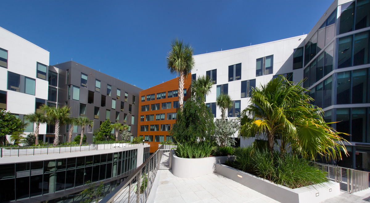 Architectural daytime view of UM Lakeside Village Student Housing in Miami, FL