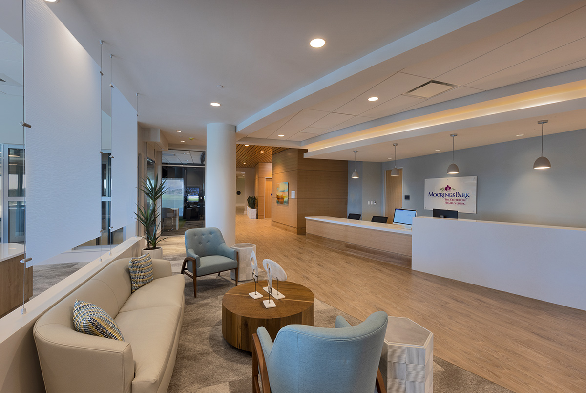 Interior design spa reception view of Moorings Grand Lake Clubhouse in Naples, FL.