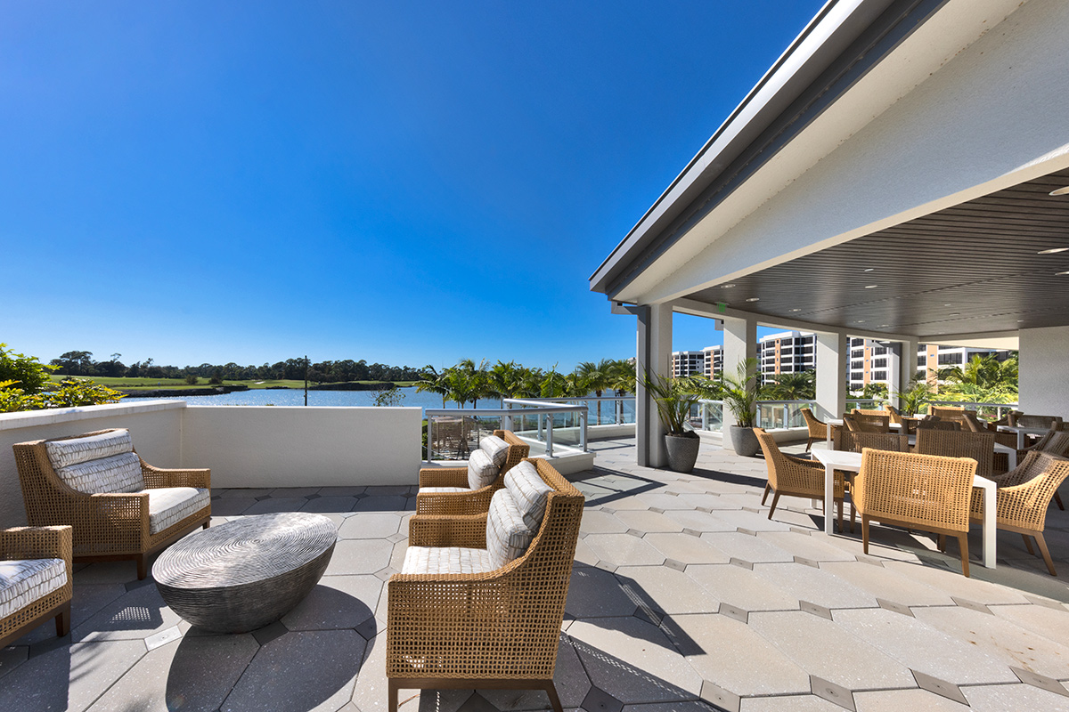 Architectural terrace view of Moorings Grand Lake Clubhouse - Naples, FL.