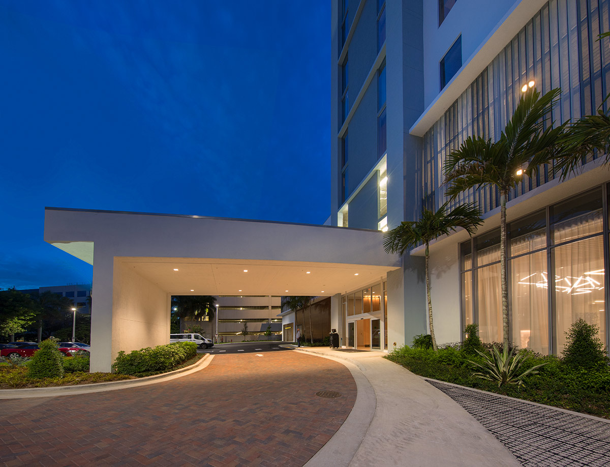 Architectural dusk view of the AC Hotel entrance Aventura, FL