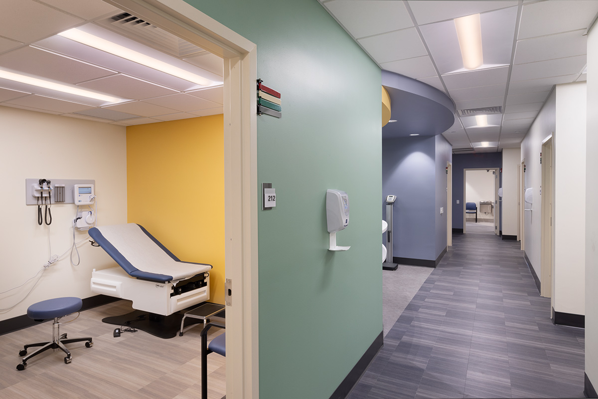 Interior design view of the Foundcare clinic treatment rooms and corridor in West Palm Beach, FL.