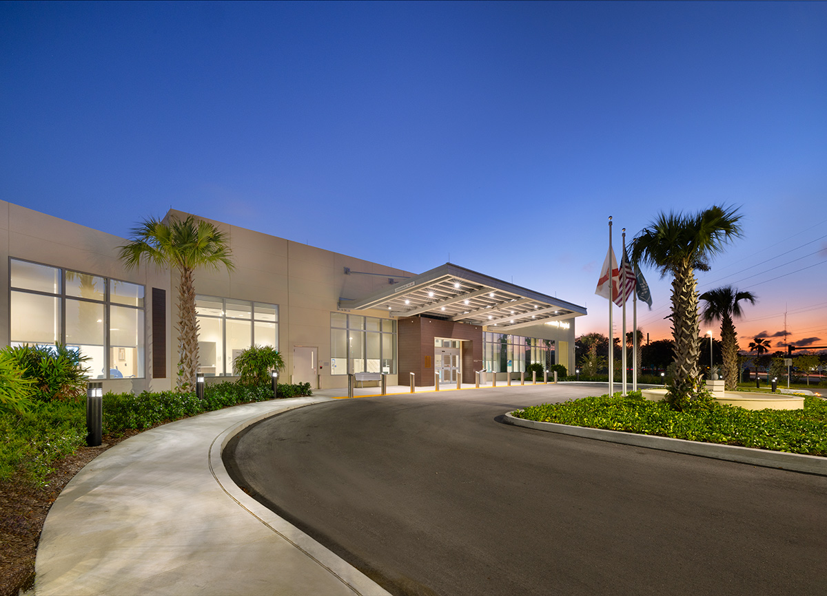 Architectural dusk entrance view of Baptist Fishermen's Community Hospital in Marathon, FL