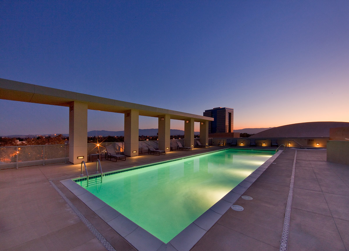 Architectural dusk pool view of Three Sixty Residences - San Jose, CA 