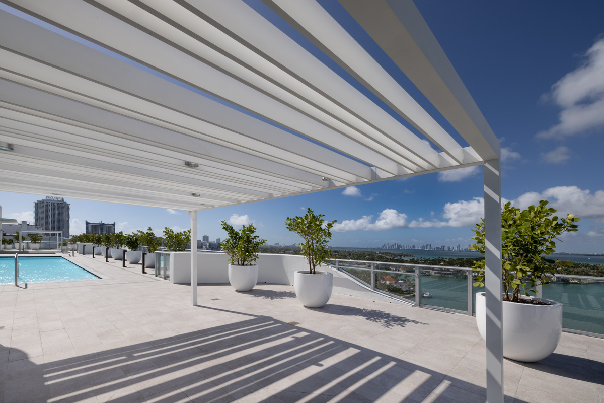 Architectural pool view at Monaco Yacht Club condo in Miami Beach, FL.