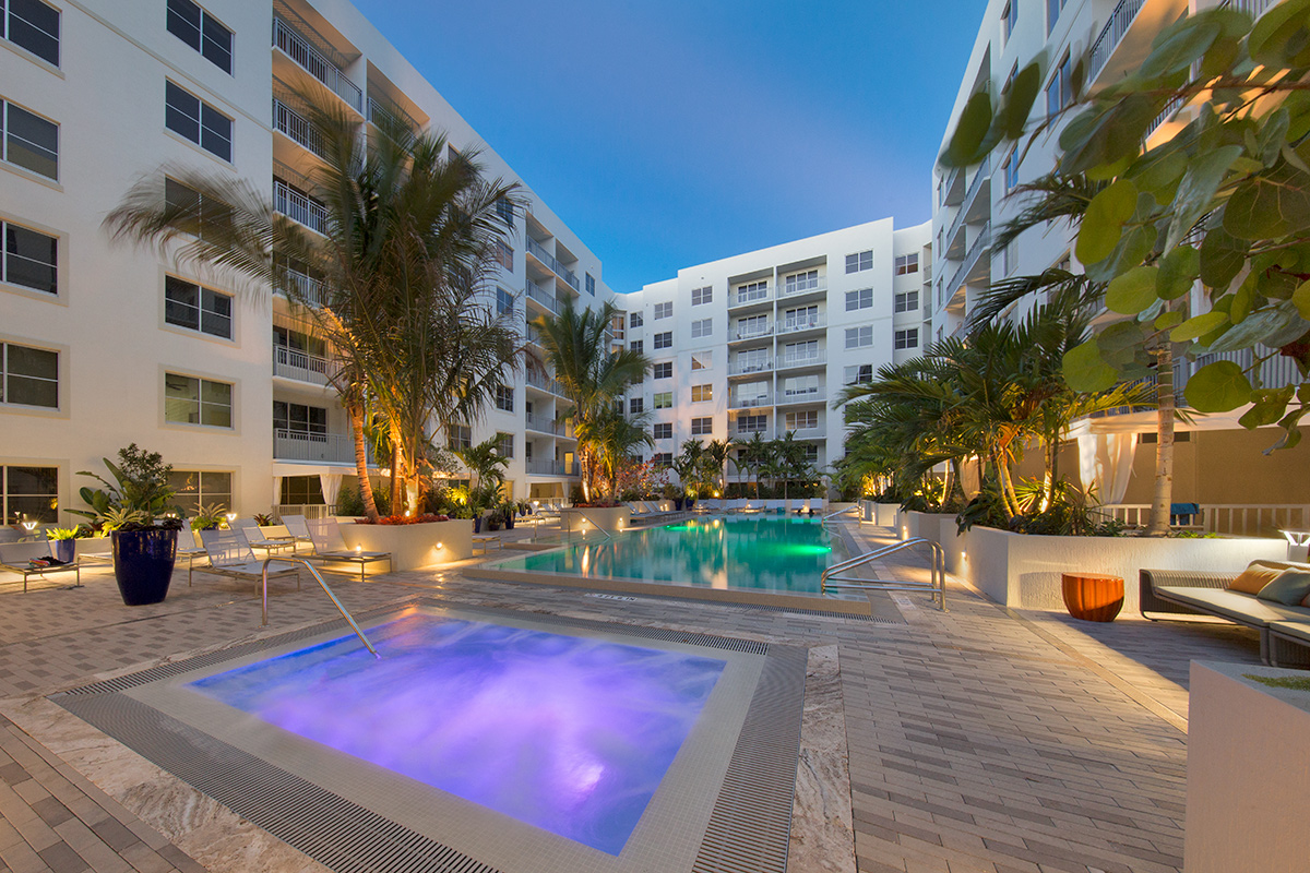 Architectural dusk pool view of The Manor Lauderdale by the Sea rentals - Fort Lauderdale, FL 