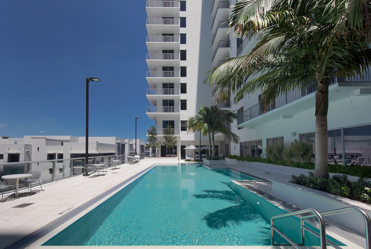 Architectural pool deck view at Allegro Dadeland Senior Living - Miami, FL