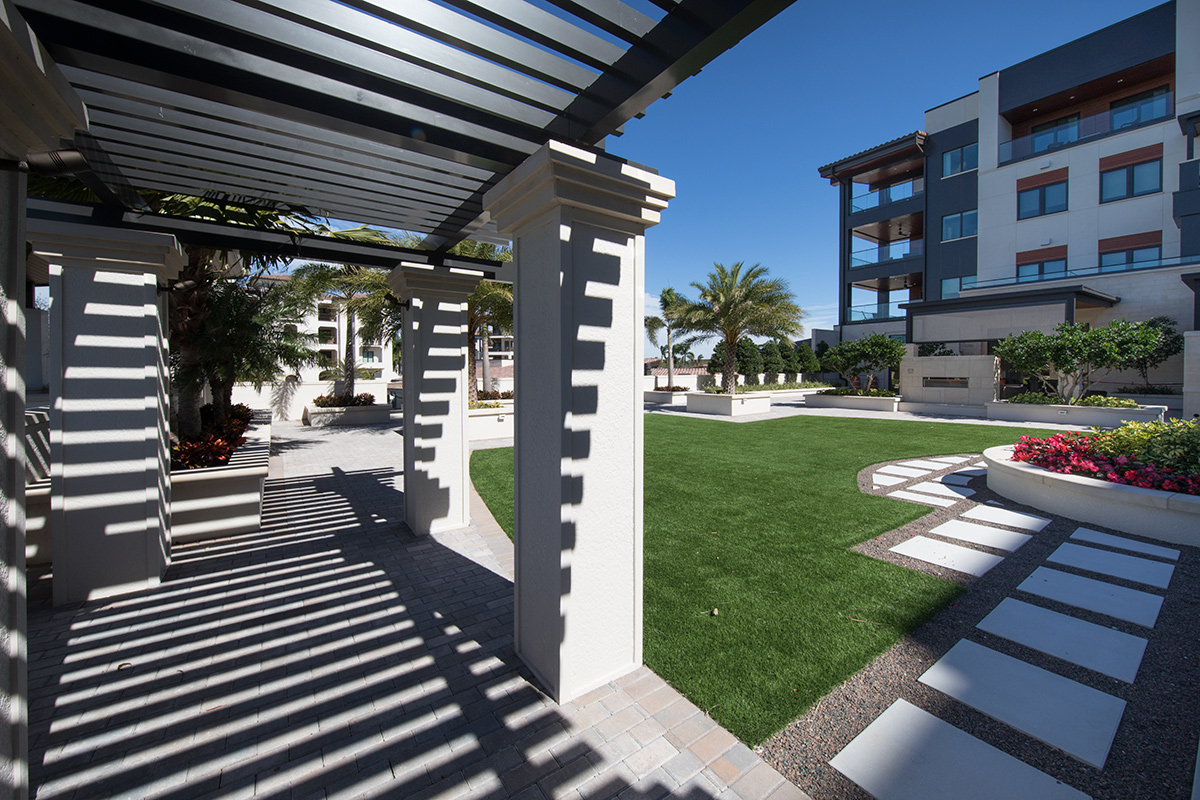 Architectural view of Moorings Park at Grey Oaks senior living in Naples, FL.