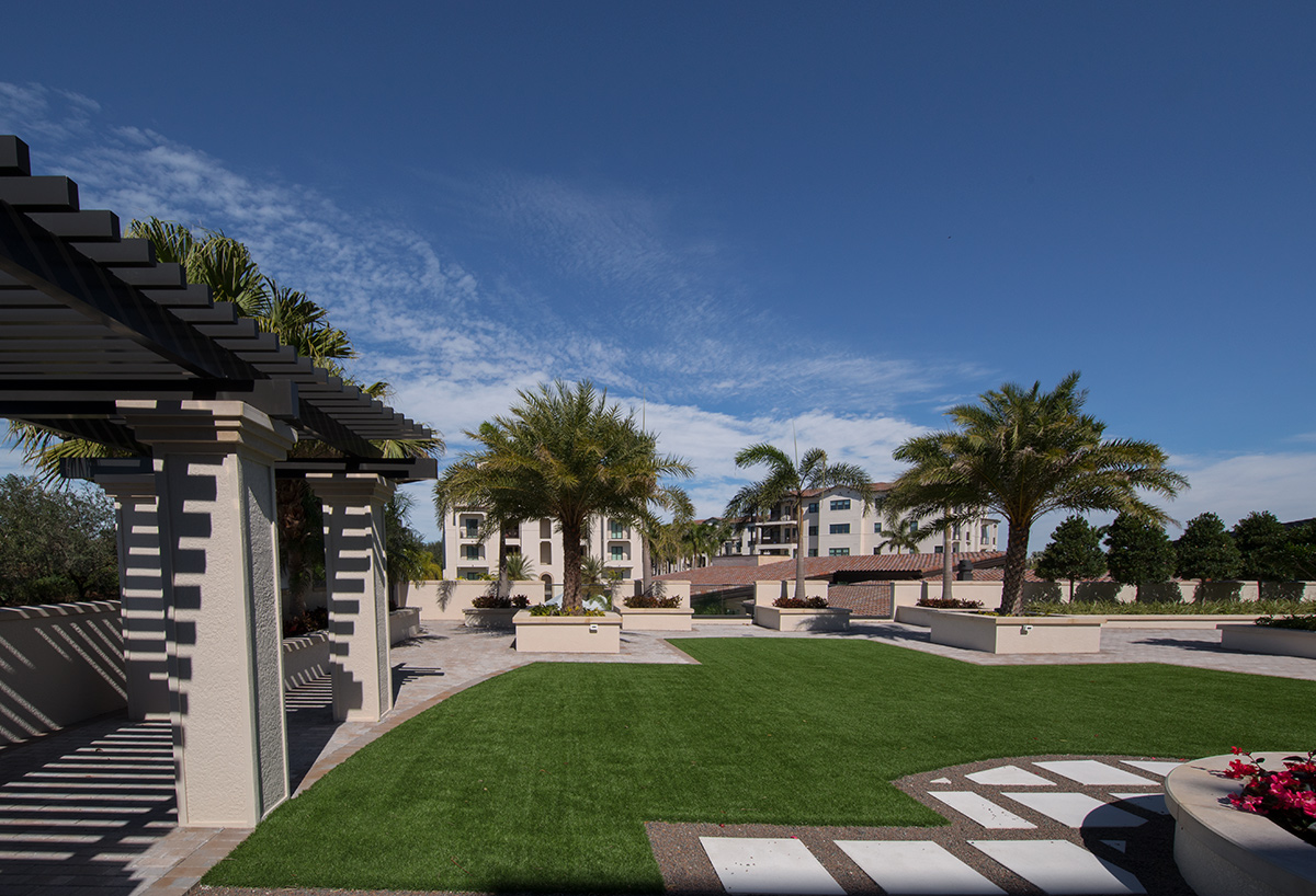 Architectural view of Moorings Park at Grey Oaks senior living in Naples, FL.