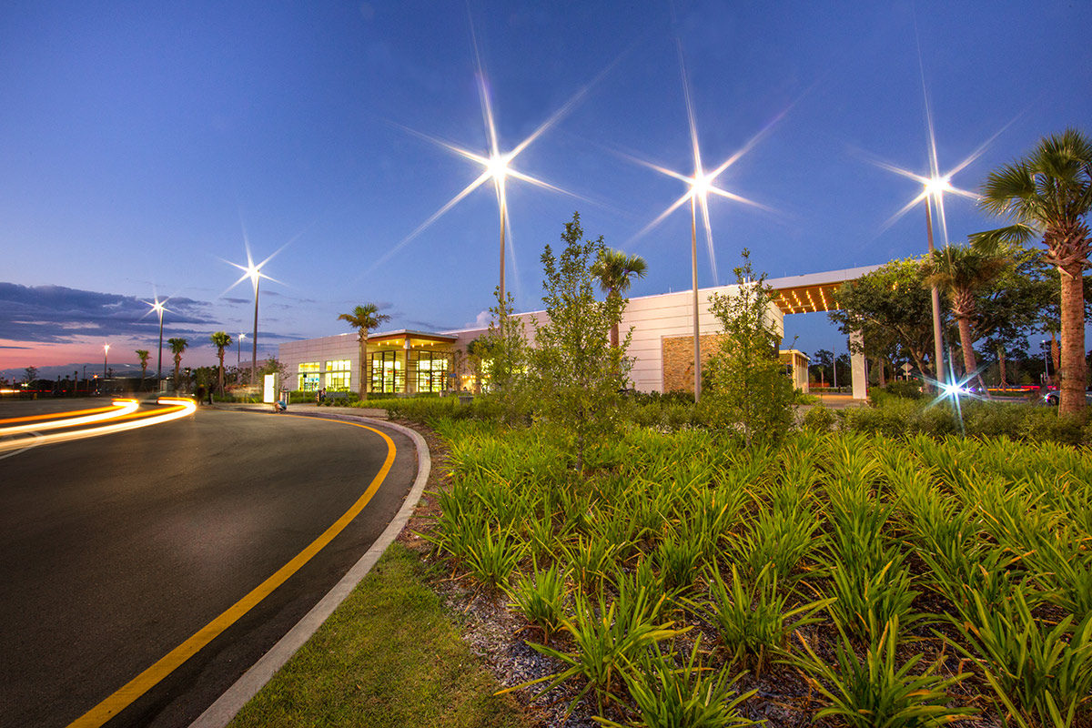 Architectural dusk landscape view of the Fort Drum Service Plaza - Okeechobee, FL