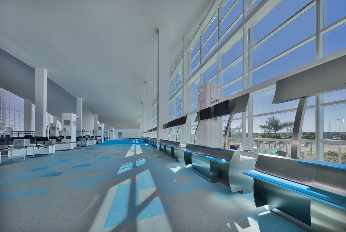 Interior design guest checkin view of the Norwegian Cruise Lines Terminal B Port Miami.