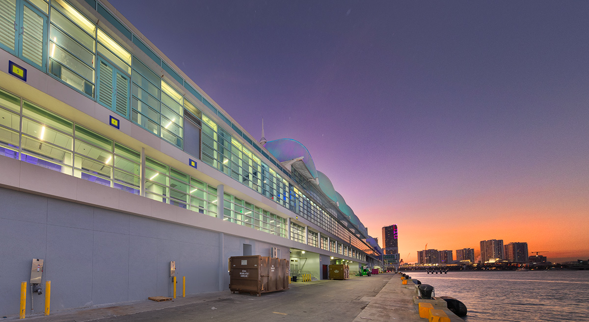 Architectural dusk view of Port Miami terminal F boarding apron.